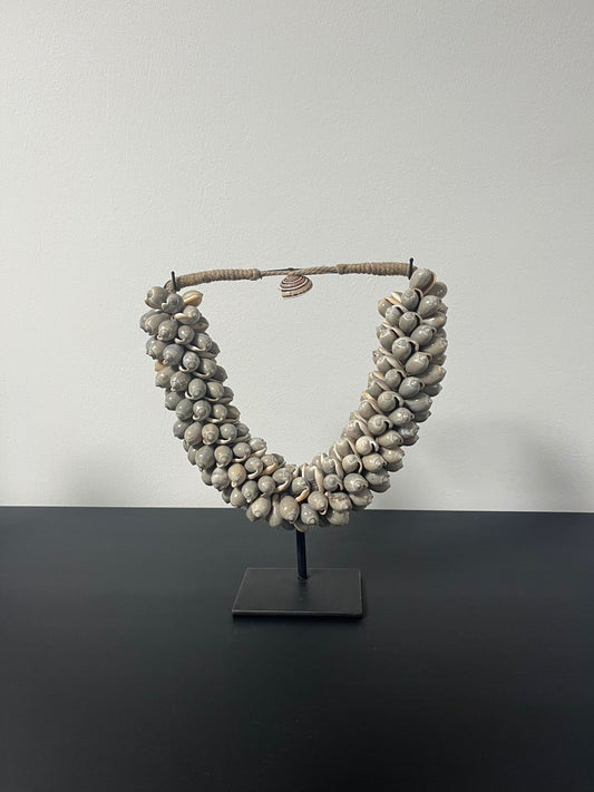 Schelpenketting sand